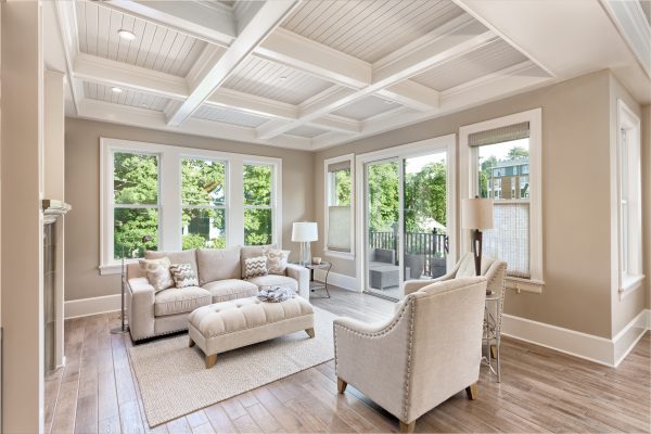 Room Addition Contractors Lake Geneva: Beautiful living room with hardwood floors in new luxury home