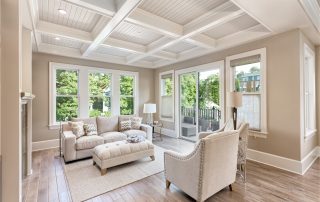 Room Addition Contractors Lake Geneva: Beautiful living room with hardwood floors in new luxury home